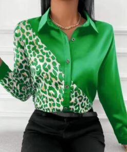 woman wearing green leopard print colorful blouse and black jeans