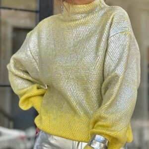 woman wearing metallic colorful sweater, silver jeans and a silver bracelet