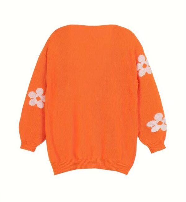 back view of orange color cardigan on the white background