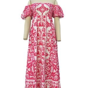 pink colorful bohemian dress on a mannequin, white background