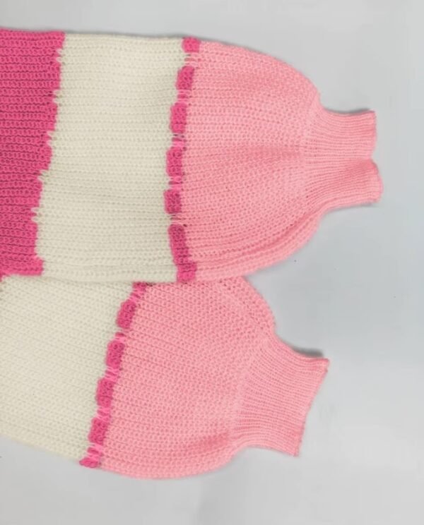 the sleeves of pink colorful sweater on the white background