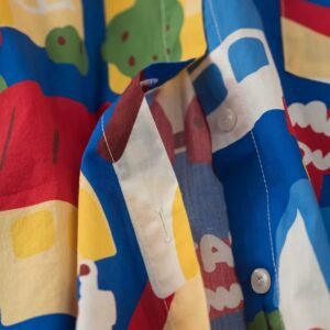 material and buttons of playful colorful blouse