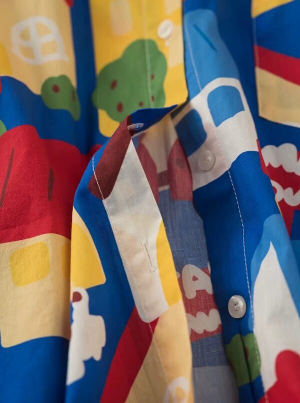 material and buttons of playful colorful blouse