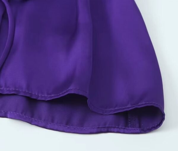 the lining and threads of the purple blouse