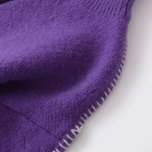 shoulder of purple cardigan