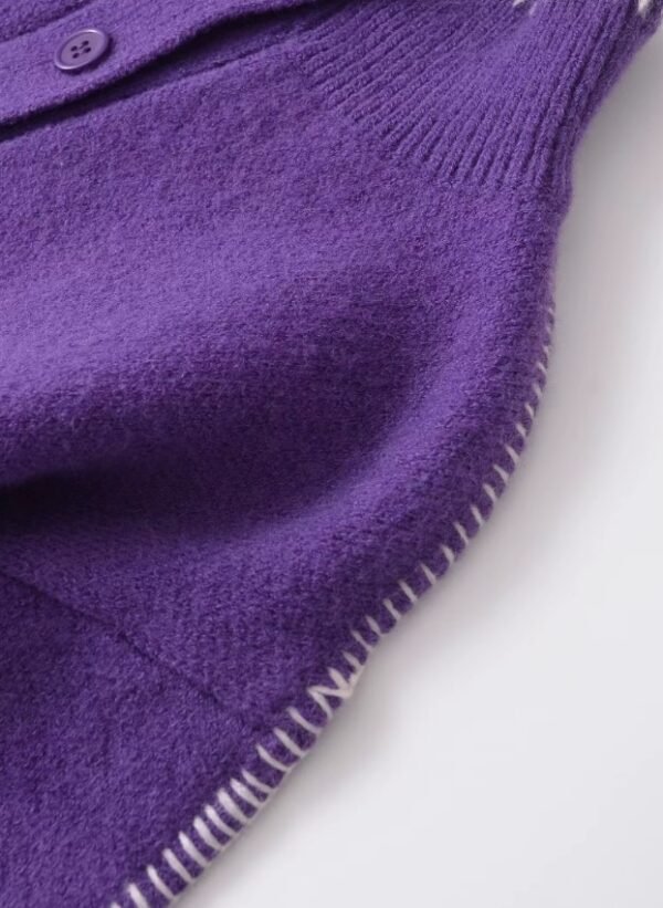 shoulder of purple cardigan