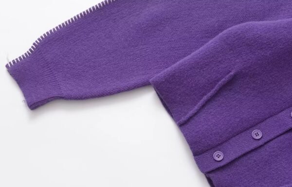 sleeve of purple cardigan