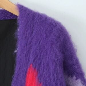 shoulder of thick colorful cardigan