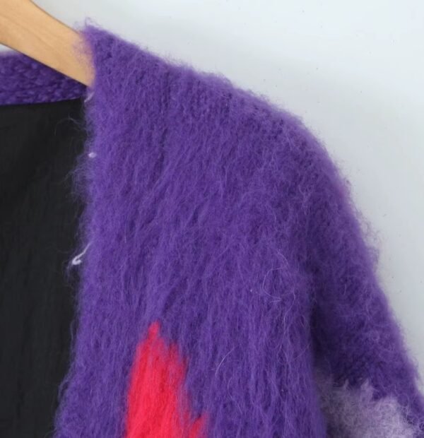 shoulder of thick colorful cardigan