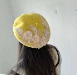 woman wearing yellow colorful lace beret