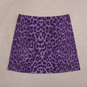 back view of colorful leopard skirt on the beige background