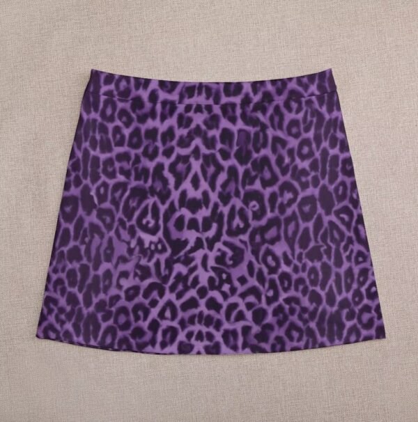 back view of colorful leopard skirt on the beige background