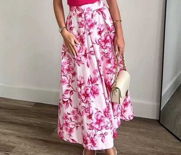 woman wearing Japanese colorful skirt and holding a white purse