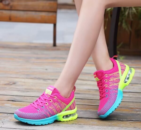 woman wearing athletic colorful sneakers, brown bench in the background