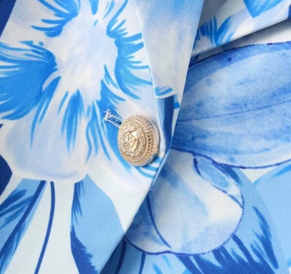 button and material of blue floral blazer