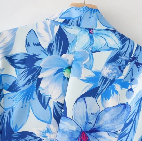 material and upper part of blue floral blazer