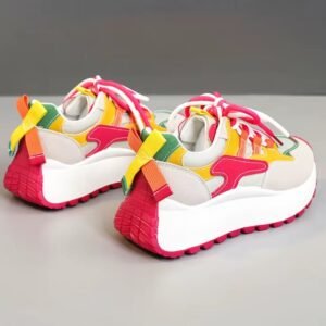 back view of casual colorful sneakers on the grey background