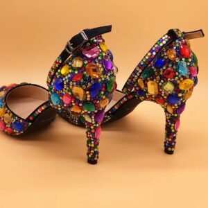 back view of colorful ankle strap heels on the yellow background