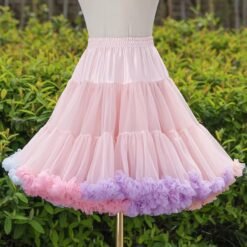 colorful ballerina skirt on a mannequin, bushes in the background