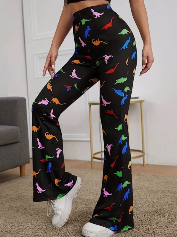 woman turned to her side wearing colorful dinosaur pants and white sneakers