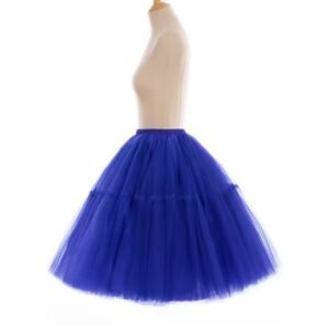 side view of colorful evening skirt on a mannequin, white background