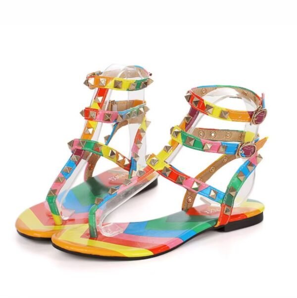 side view of colorful gladiator sandals on the white background