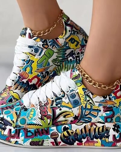 woman wearing colorful graffiti sneakers