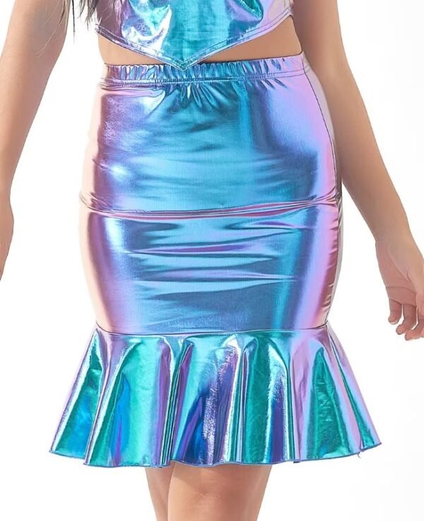 woman wearing colorful holographic skirt and a matching top, white background