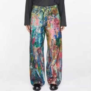 woman wearing colorful painted pants, black shoes and black blouse