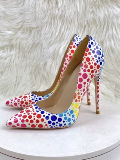 colorful polka dots heels standing on a white stool