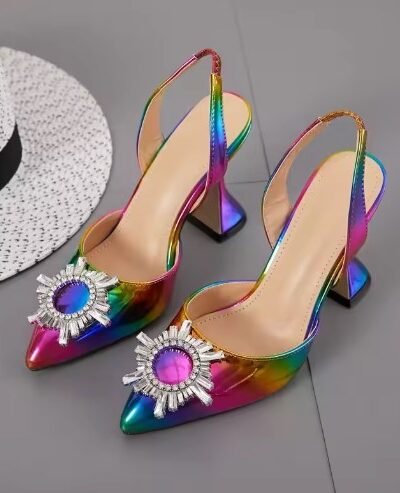 colorful rhinestone heels on the grey floor