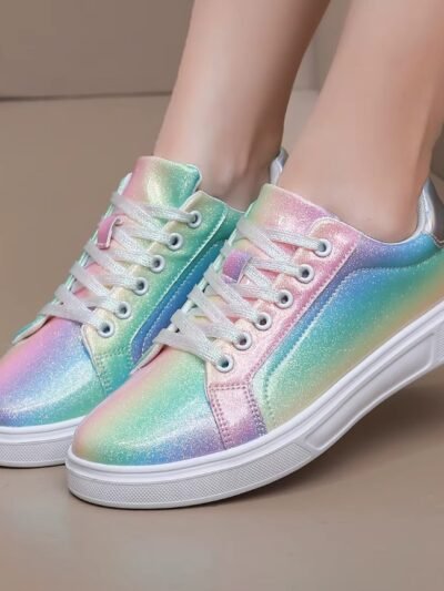 woman wearing colorful skate sneakers on the beige background