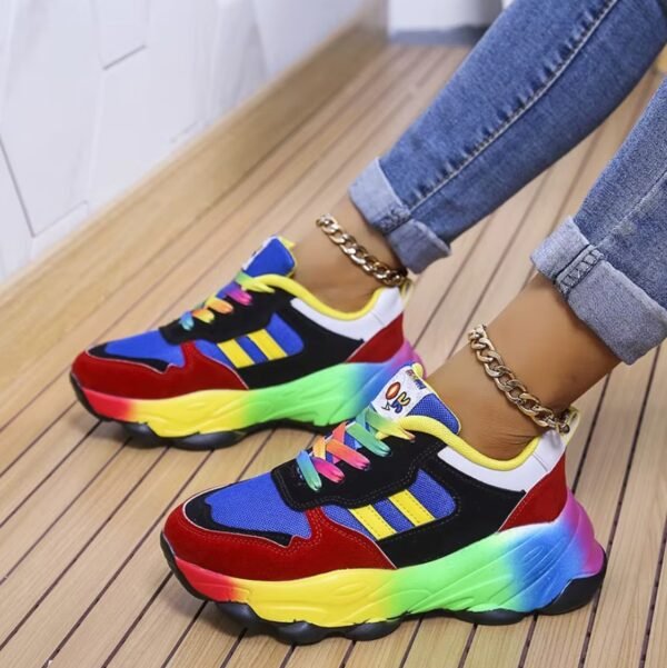 woman wearing colorful sneakers for women exposing their side view, wooden floor under the sneakers