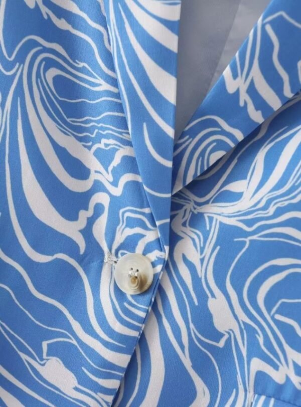 button of colorful zebra blazer