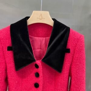 upper part and the collar of elegant colorful blazer on a hanger