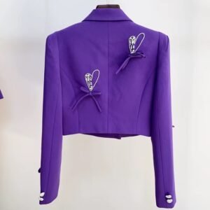 back view of female purple blazer on the white background