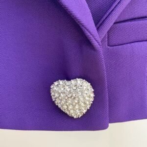 diamond button of female purple blazer