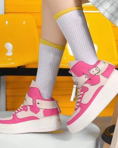 woman wearing high colorful sneakers, white socks and plaid skirt