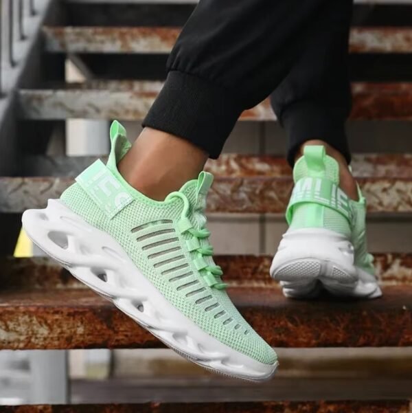 woman walking in mint sneakers on brown stairs