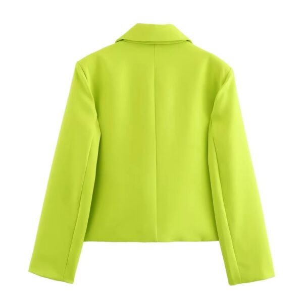 back view of neon yellow blazer on the white background