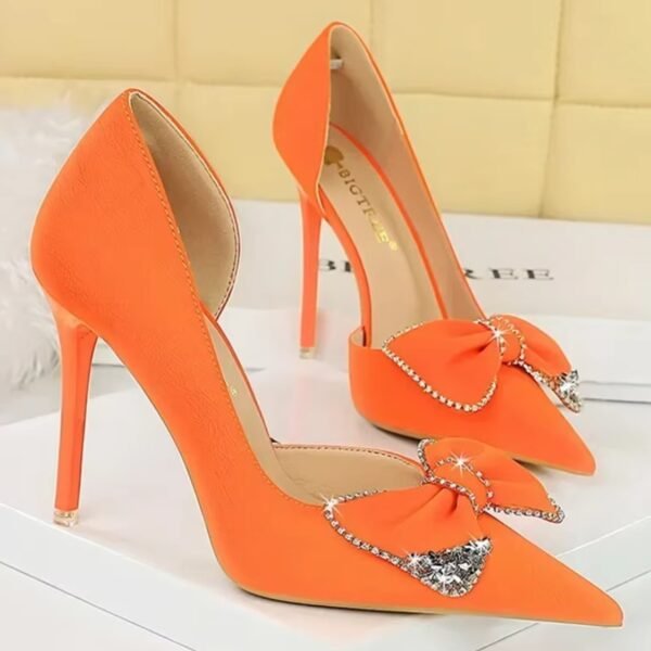 orange heels, front and side view, on the white box