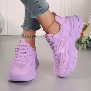 woman wearing lavender pastel sneakers exposing their side view