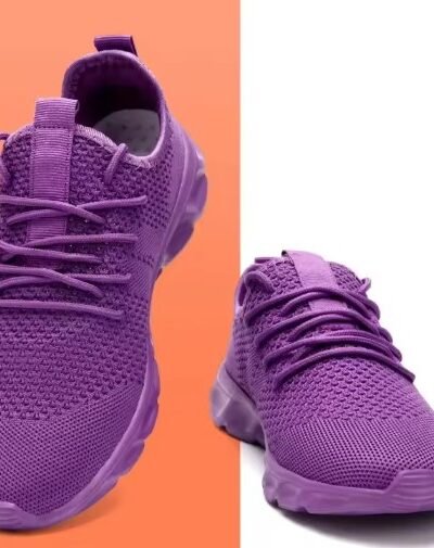 purple sneakers for women, front and side view, on white and orange background