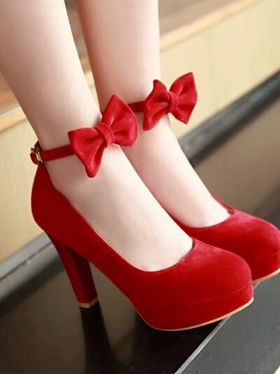 woman wearing red pumps