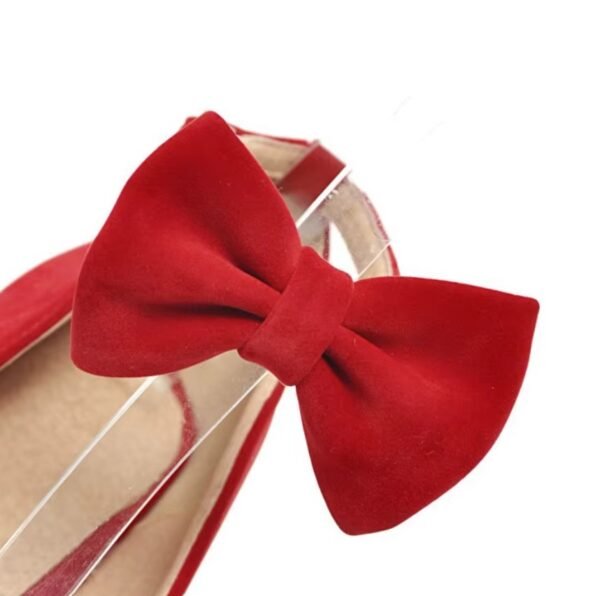 ribbon of red pumps