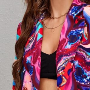 collar and upper part of shiny colorful blazer worn by a woman