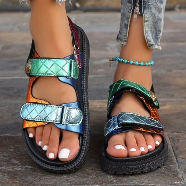 woman wearing sporty colorful sandals and blue ankle bracelet