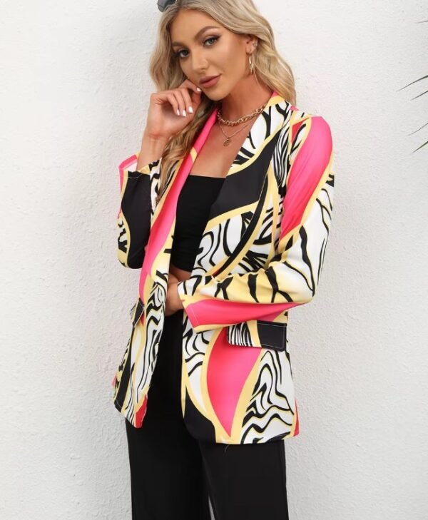 blonde woman wearing stylish colorful blazer and black pants