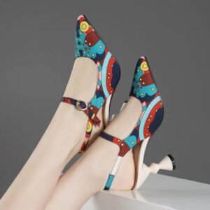 woman wearing unique colorful heels, grey background