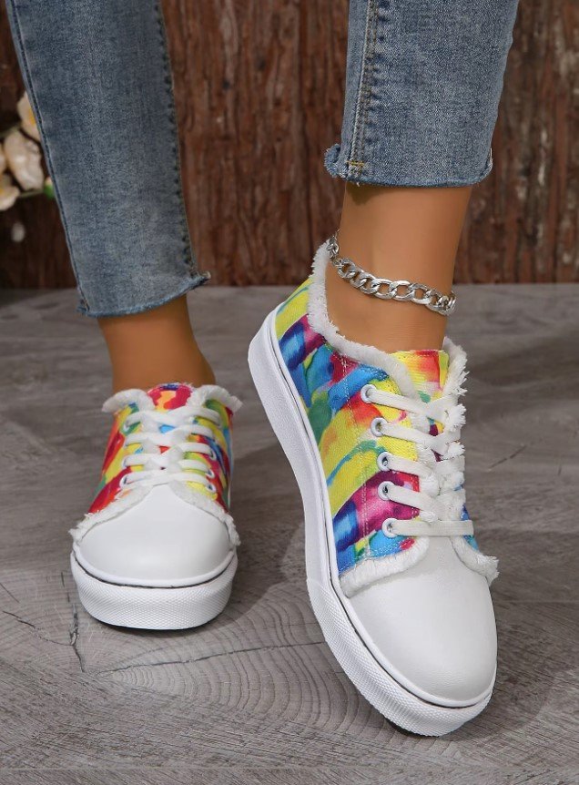 woman wearing vintage colorful sneakers and lifting one foot up